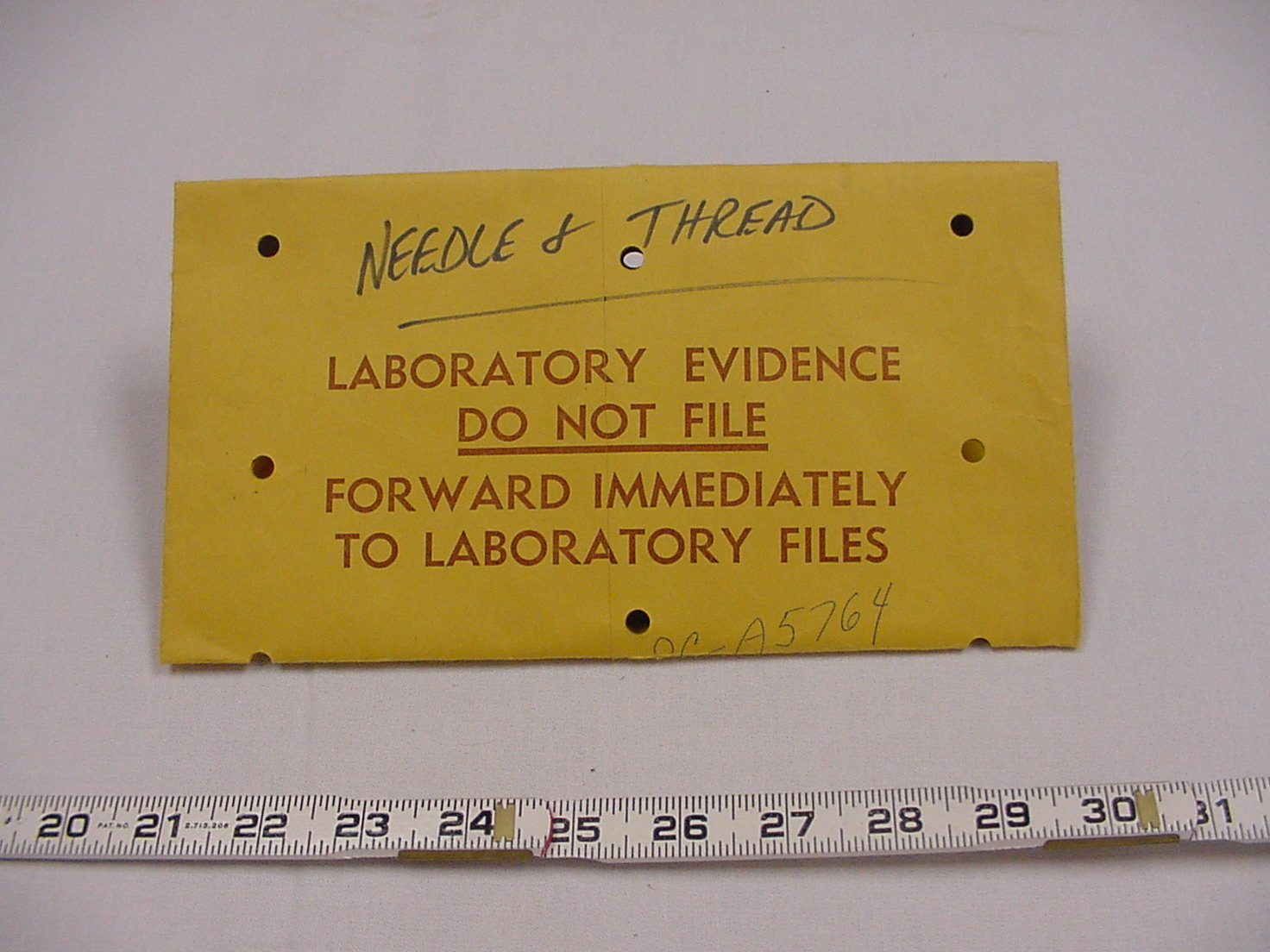 needle and thread laboratory envelope 1.jpg
